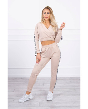 Dviejų dalių kostiumėlis su juostelėmis (Smėlio spalva) Dviejų dalių kostiumėlis su juostelėmis (Smėlio spalva)