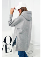 Pašiltintas megztinis su skeltukais šonuose (Pilka)