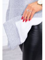 Pašiltintas megztinis su skeltukais šonuose (Pilka)